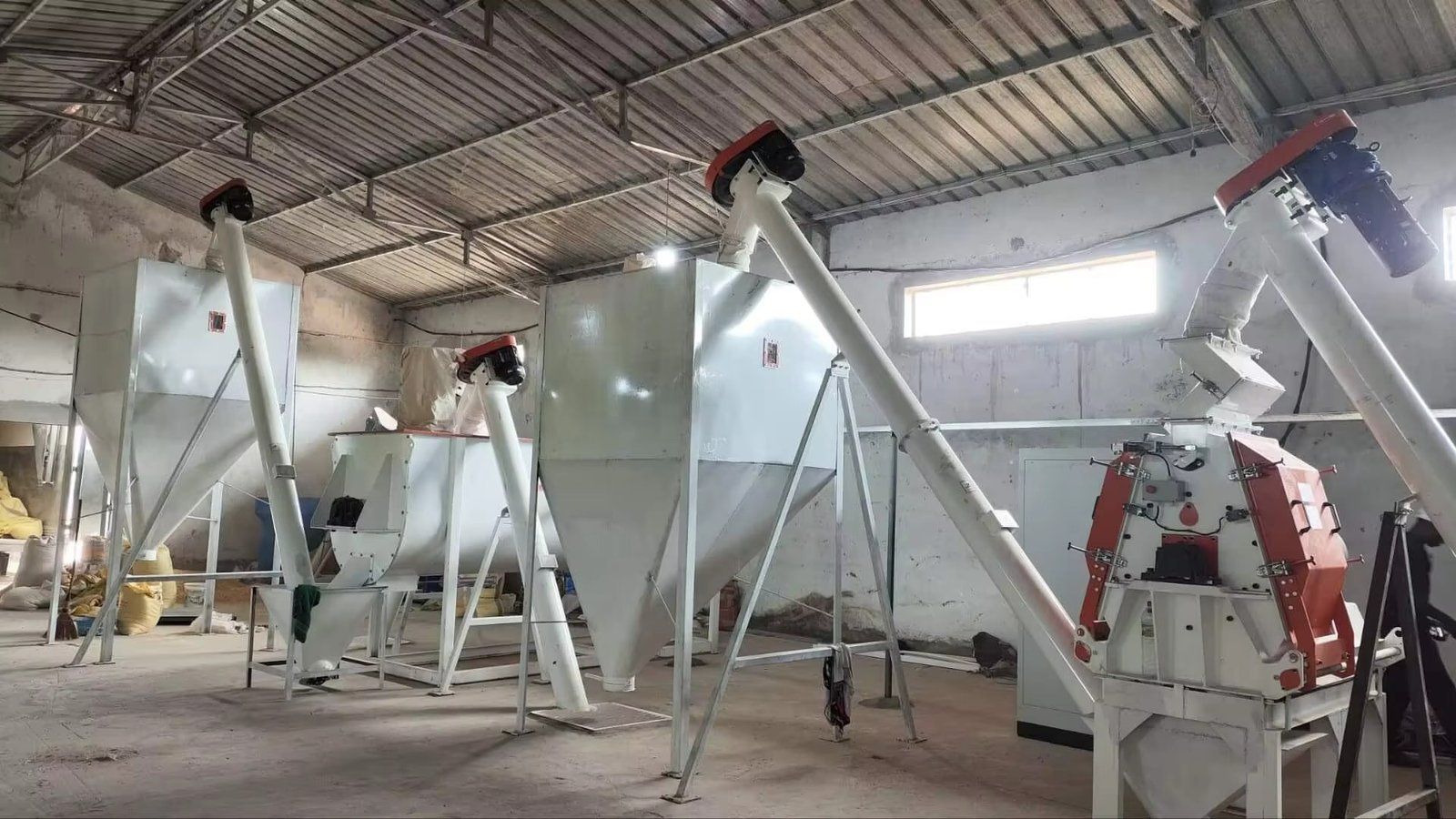 Different sizes of diesel feed pellet machines showing capacity range