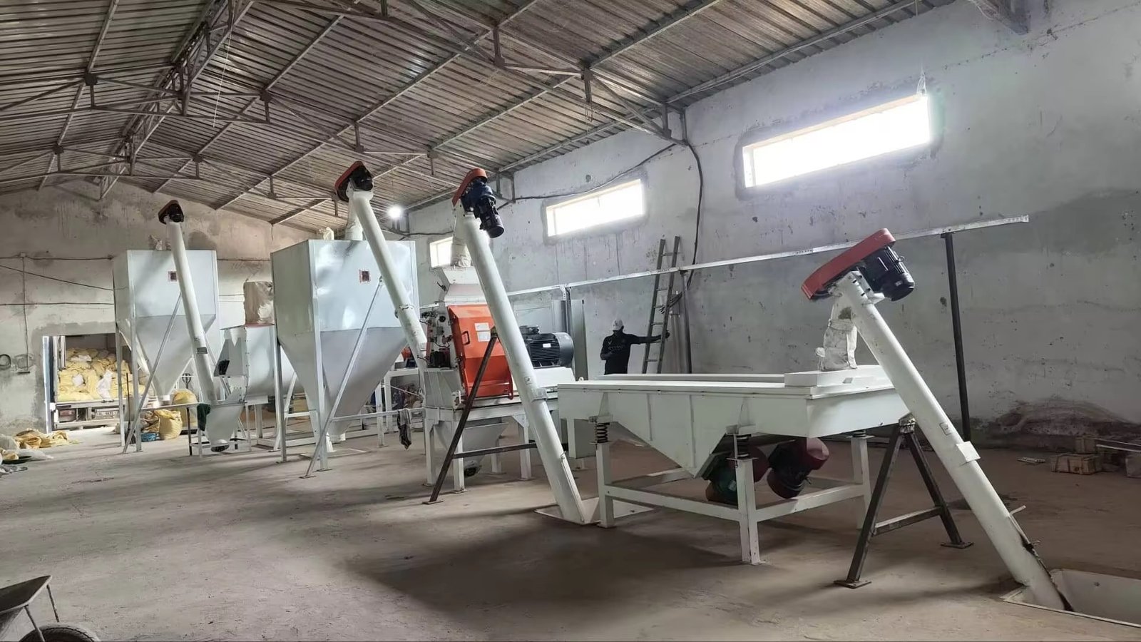 Different sizes of diesel feed pellet machines showing capacity range