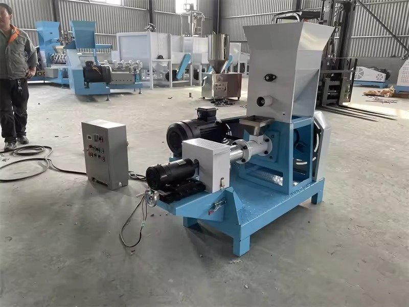 Cattle Feed Pellet Mill: Processing Grass and Grains 7 Cattle eating pelleted feed from a trough on a Nigerian farm