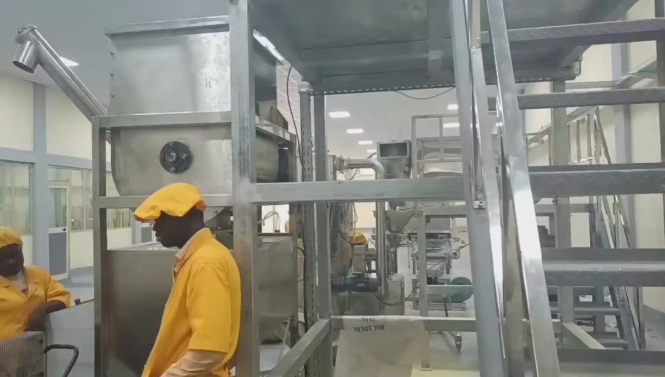 Modern feed pellet machine processing livestock feed in Nigerian farm setting